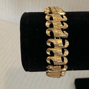 Vintage Monet Gold Tone Swirled Segmented Bracelet With Safety Clasp 7.25”